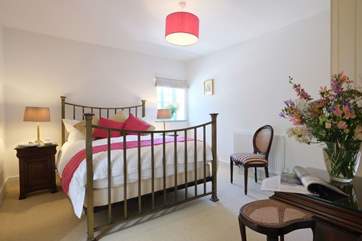 The brass bed has a luxurious Vi-spring mattress.