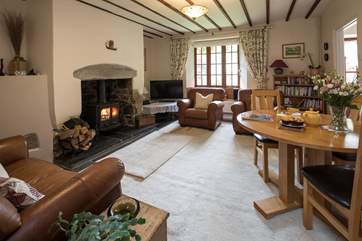 The fabulous wood-burner makes this room super cosy on chillier nights.