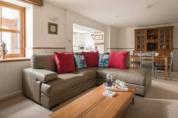 Snuggle up on the comfy corner sofa.