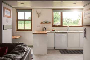 The light kitchen overlooks the garden and field beyond.