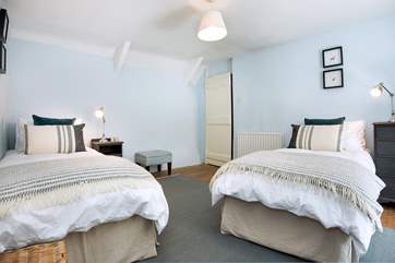 The spacious twin bedroom.