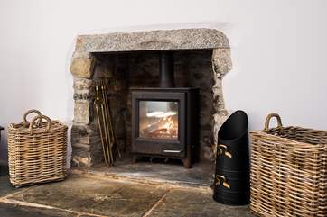 Curl up in front of the toasty wood-burner in the sitting-room.