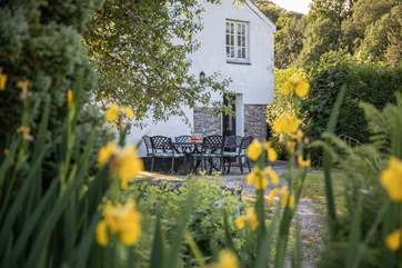 Peeking back at the cottage from the outskirts of the garden.