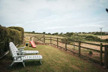Countryside views surround the cottage.