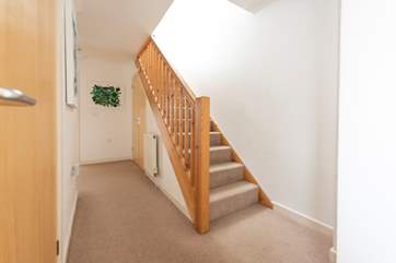 The entrance hall where stairs lead up to the first floor living area.
