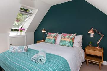 The stylish master bedroom, is styled fabulously.