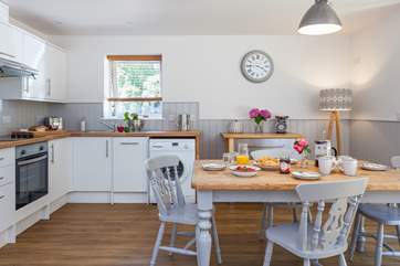 The kitchen/diner is bright and sunny and the perfect place to cook up a super spread.