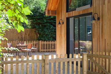 The patio doors lead out from the kitchen to the sunny deck - a perfect spot for your morning coffee.