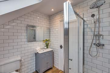 This is the en suite shower-room for the master bedroom. The wonderful shower has a rainfall drench shower head as well as a conventional one.