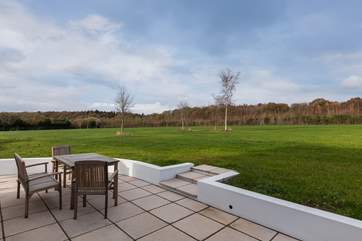 The large patio looks out over this lovely meadow. A fully enclosed garden will be created next year, giving the cottage a lovely lawn.