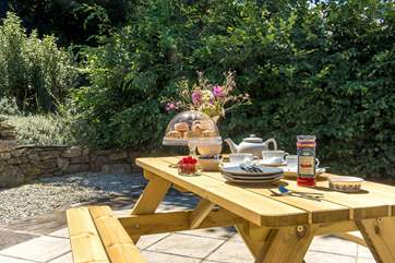 The sunny upper terrace area - the perfect spot for morning coffee or afternoon tea.