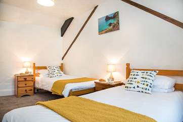 The twin bedroom is also located at the front of the apartment.