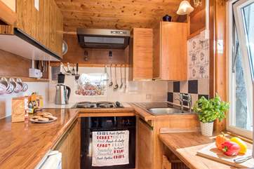 The lovely galley kitchen has all you need to cook up your holiday meals.