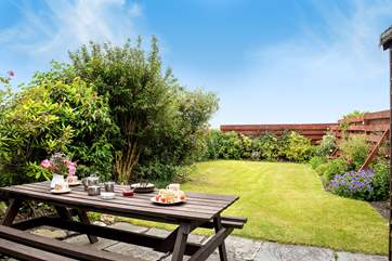 Adults can sit and enjoy a Cornish cream tea whilst younger members play on the lawn.