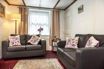 The cottage sitting-room.