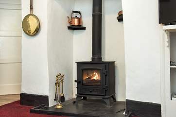 The toasty wood-burner is a welcome sight on chillier evenings.