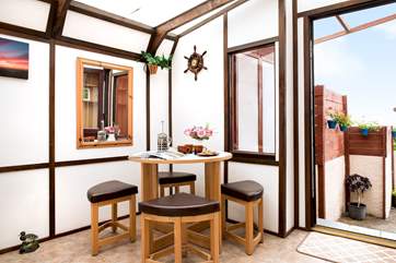 Enjoy morning coffee in the sun-room.
