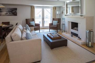 Step through the hallway doors into the living-room.