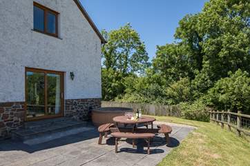 Step out of the sitting-room onto your patio.