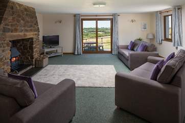 The sitting-room boasts a glorious wood-burner. Perfect for those cosy nights in.