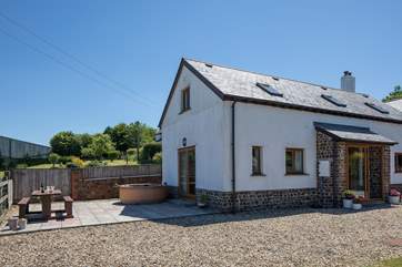 The outside space is vast and being fully enclosed it is perfect for both children and dogs alike.