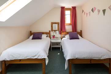 Bedroom 2 is an attractive twin room.