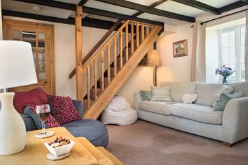 The stairs lead from the lounge