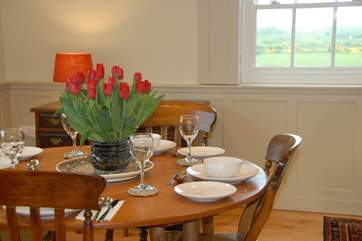 Enjoy a family meal around the table.