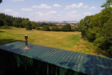 Sat looking across miles of rolling unspoilt countryside to the hills and horizon beyond.