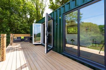 Large double doors open up to make the most of this special setting.