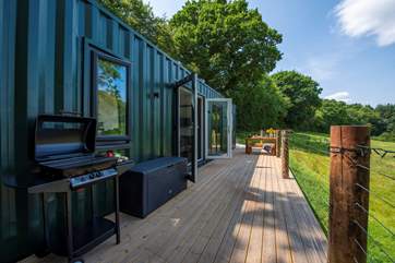 The large deck is the perfect spot for al fresco dining or just relaxing and enjoying the sights and sounds of the countryside.