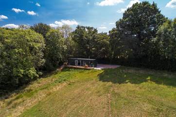 Tucked away on the edge of Huxham Wood, the location is also within easy reach of the East Devon coast too.