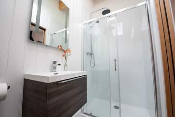 With plenty of space and a lovely big rainfall shower head.