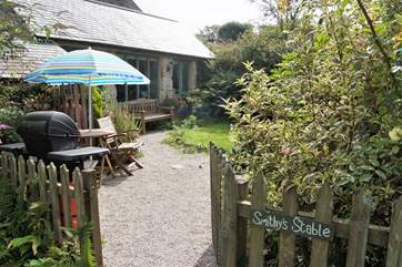 Enter the cottage via the enclosed garden.