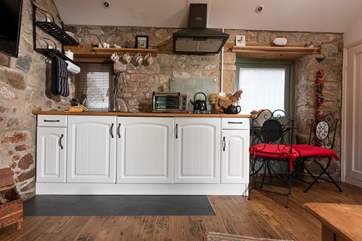The kitchen and dining-area.