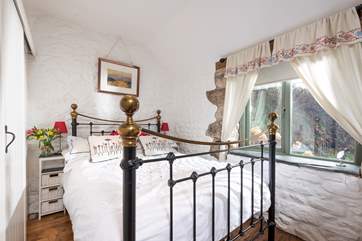 Wake up to views of the garden from your comfy double bed.