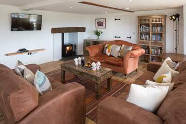 Light the wood-burner and snuggle up in front of a good film.