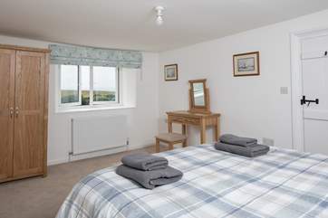The master bedroom (bedroom 2) has super views to start your day on a high.