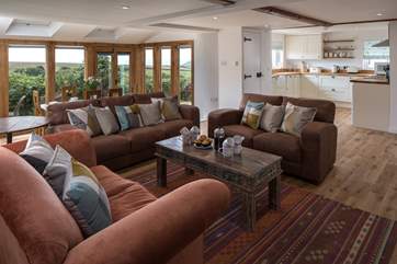 The super comfy lounge is also fully equipped with a wood-burner. The perfect area to snuggle up in after a full day of exploring your beautiful surroundings.