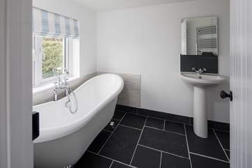 The en suite to bedroom four is beautifully finished.