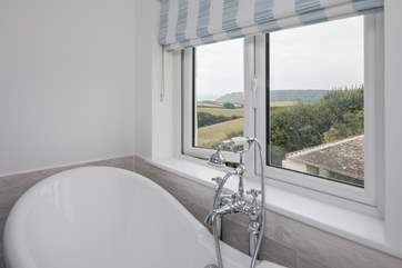 Not many places offer a roll-top bath for two, with such amazing views. Now this is what I call special!