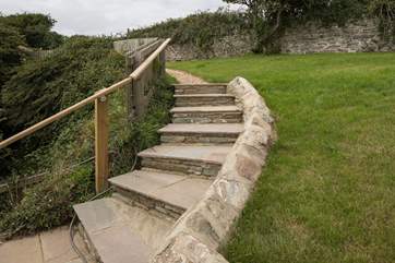These sweeping steps take you up to your second patio area.