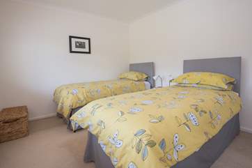 The tastefully decorated twin bedroom