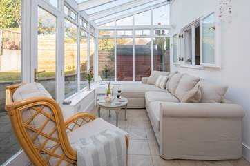 The conservatory has cosy under-floor heating.