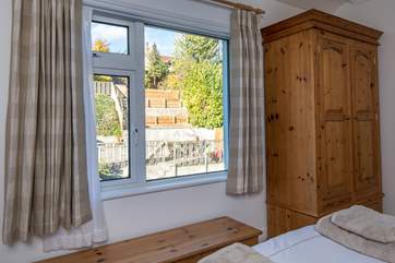 Bedroom 2 has views out over the terraced garden.