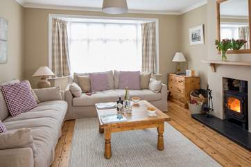 Two large comfy sofas and a cosy wood-burner invite you to relax.
