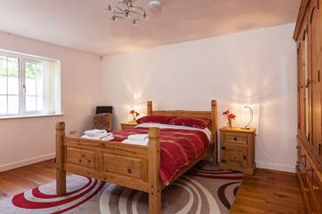 Bedroom 1 is located on the ground floor and also has an en suite shower-room.