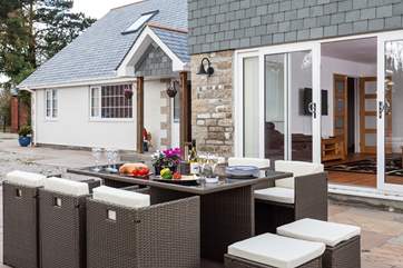 The front patio has a gorgeous wicker table and chairs, and is simply lovely for an al fresco dinner.