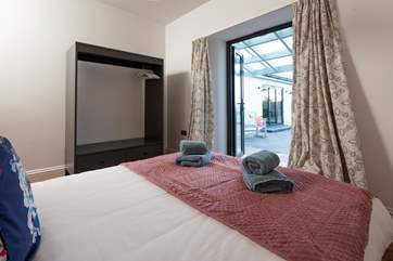 ...and has patio doors that lead out to the terrace.
