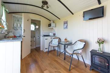 There is a little dining area and TV/DVD player too, perfect for a night in.